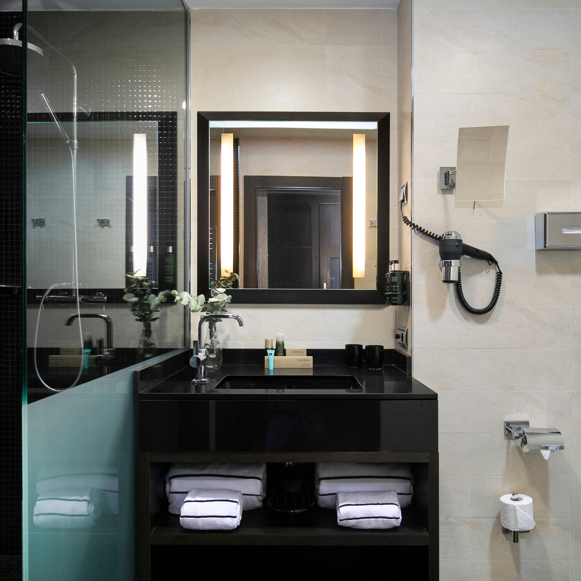 a bathroom with a mirror and sink