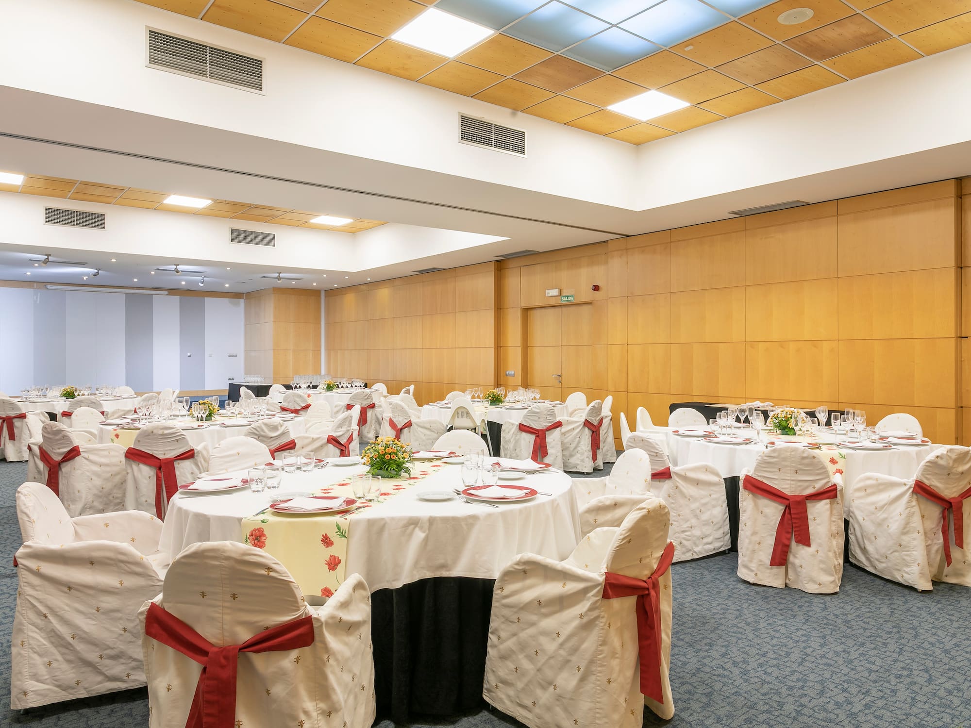 a room with tables and chairs