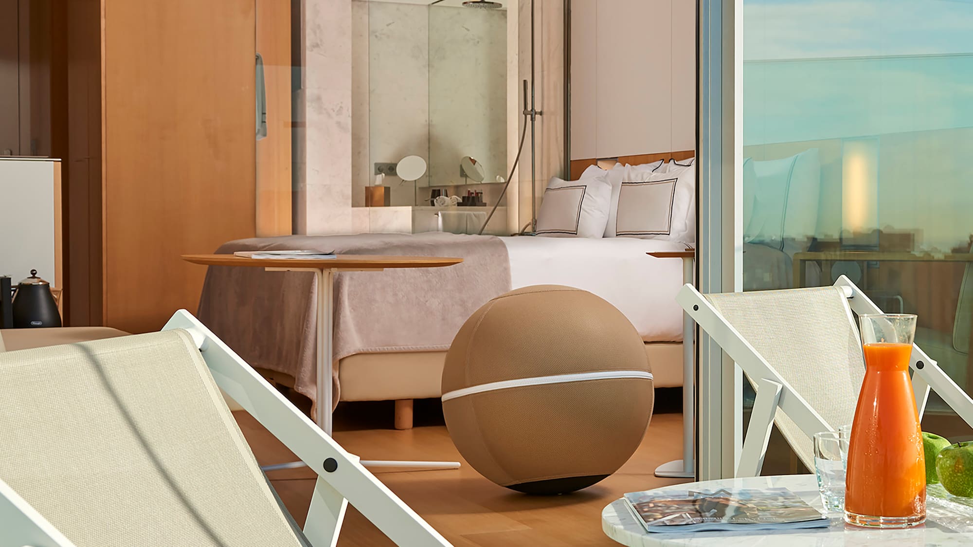 a chair and table on a balcony