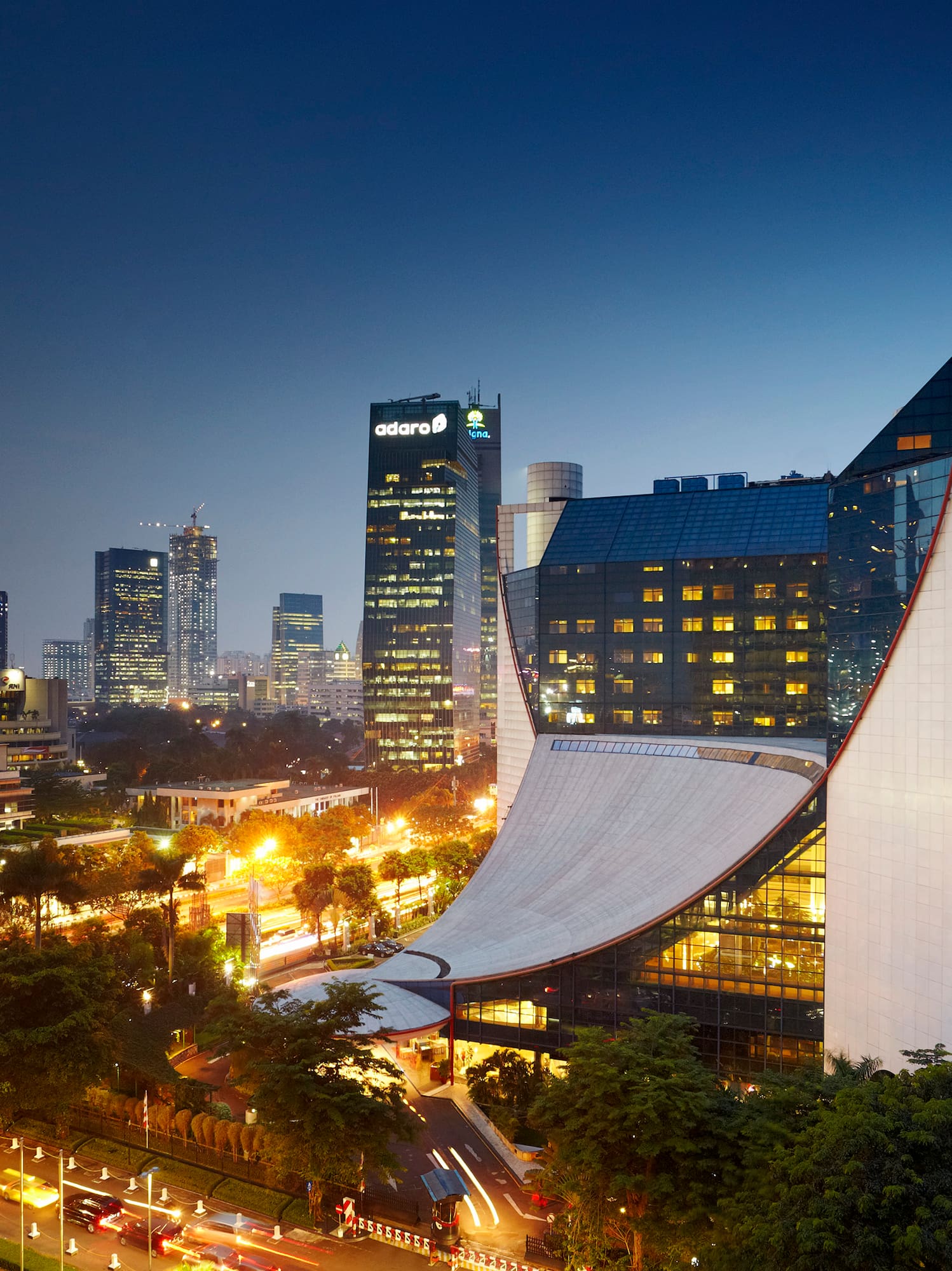 a city with a curved roof and a curved building