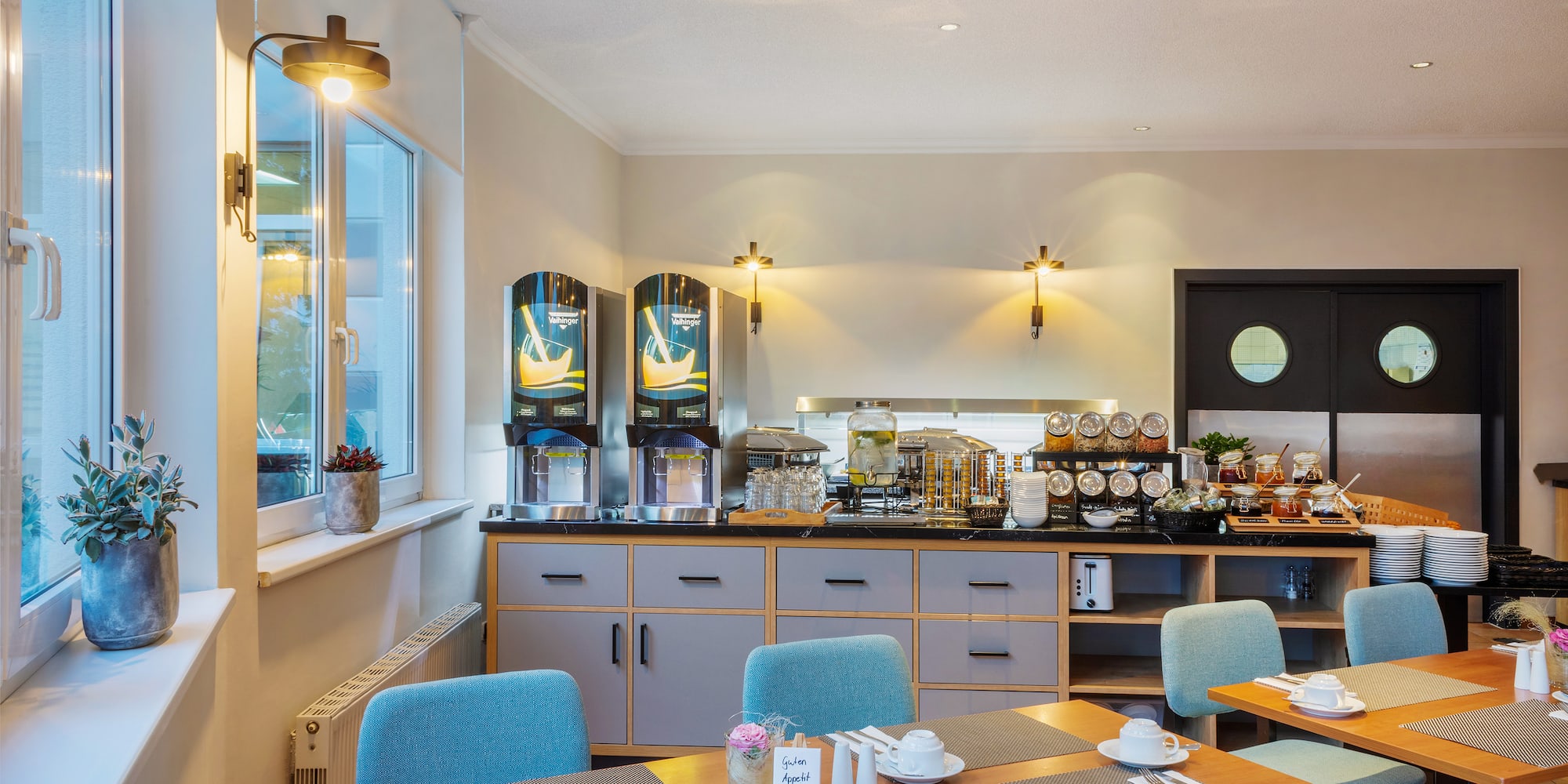 a room with a table and chairs