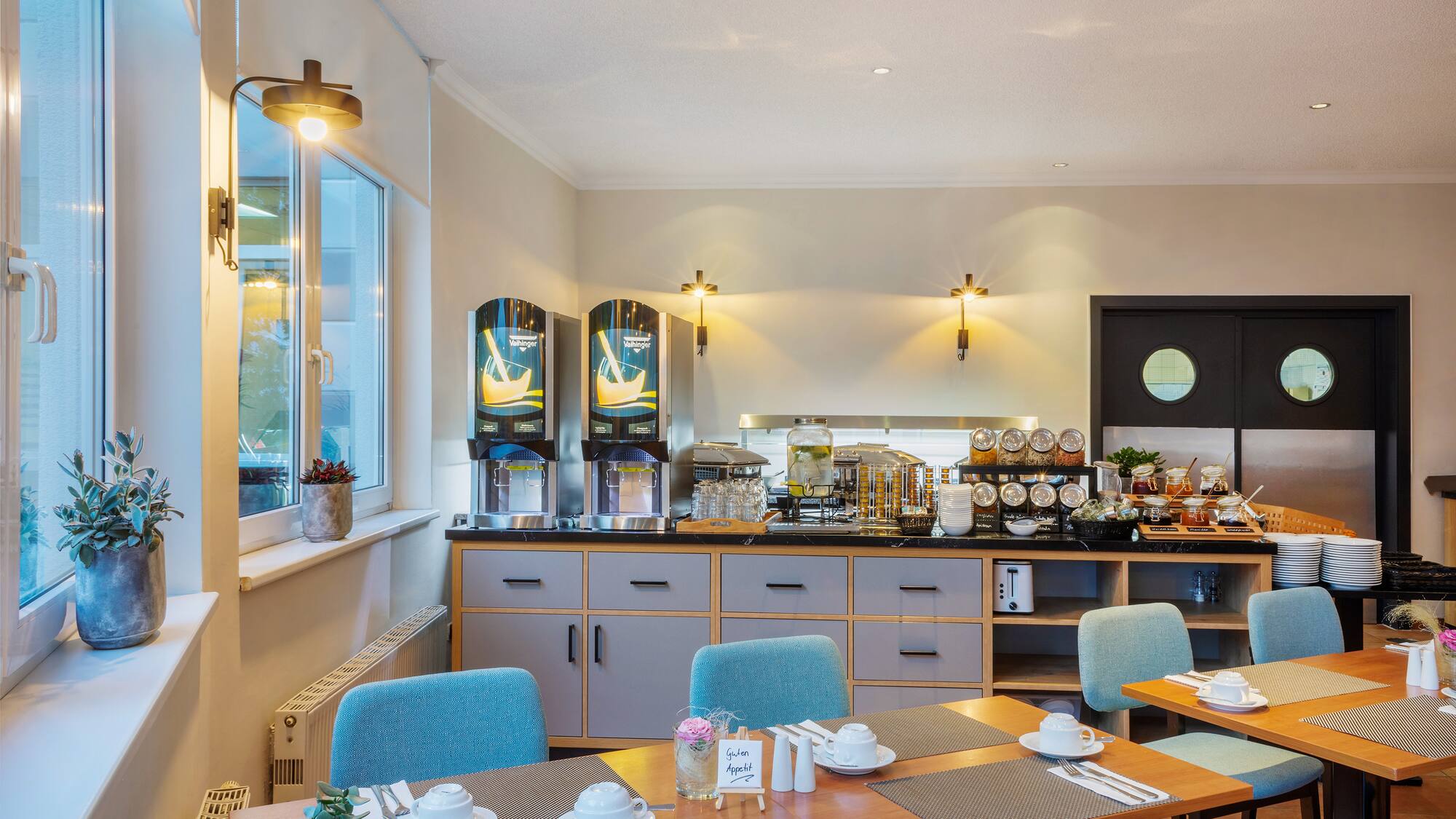 a room with a table and chairs