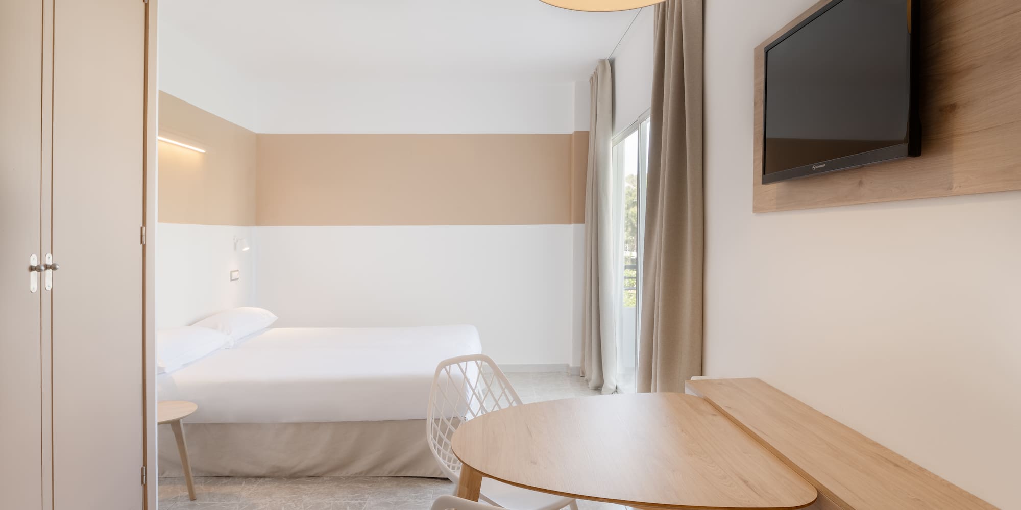 a room with a bed and a table