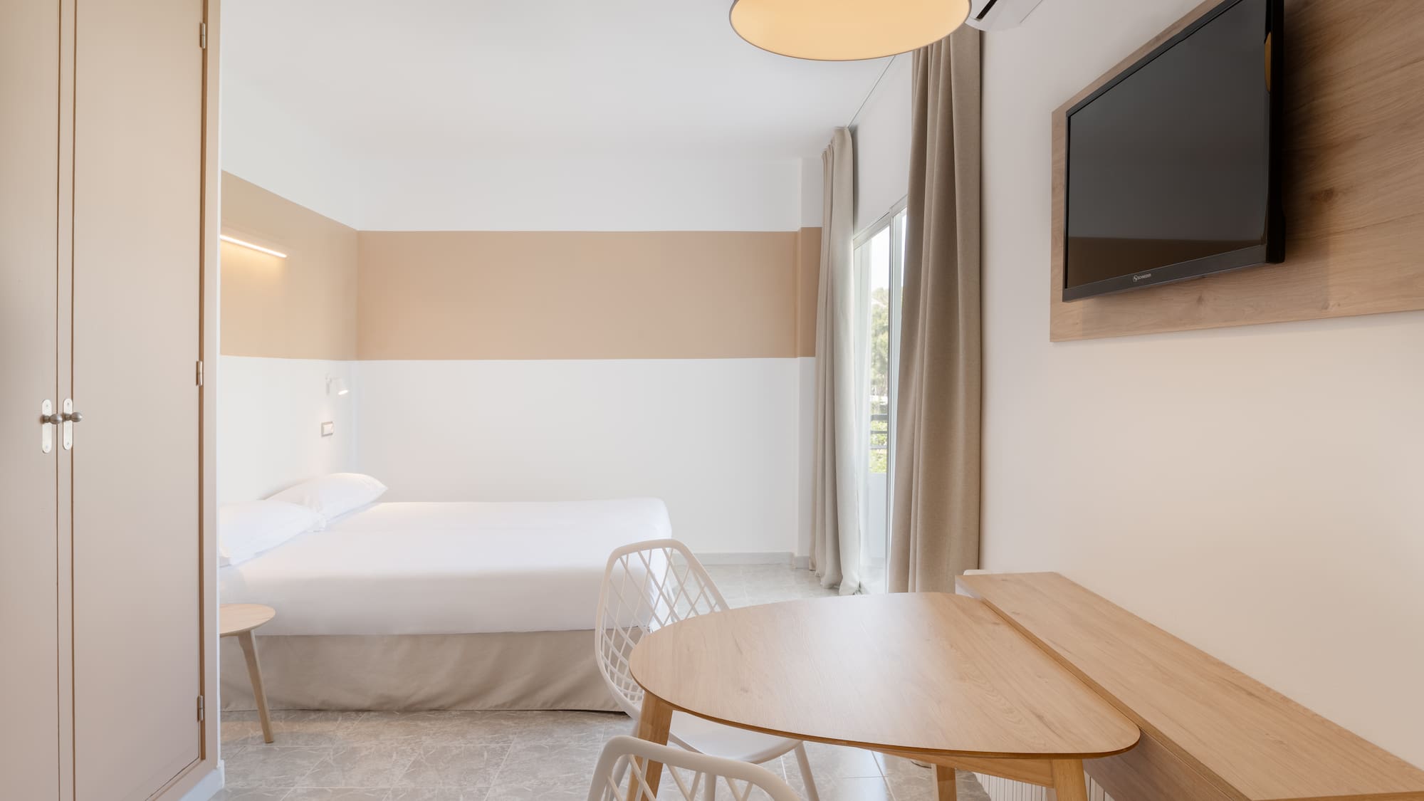 a room with a bed and a table