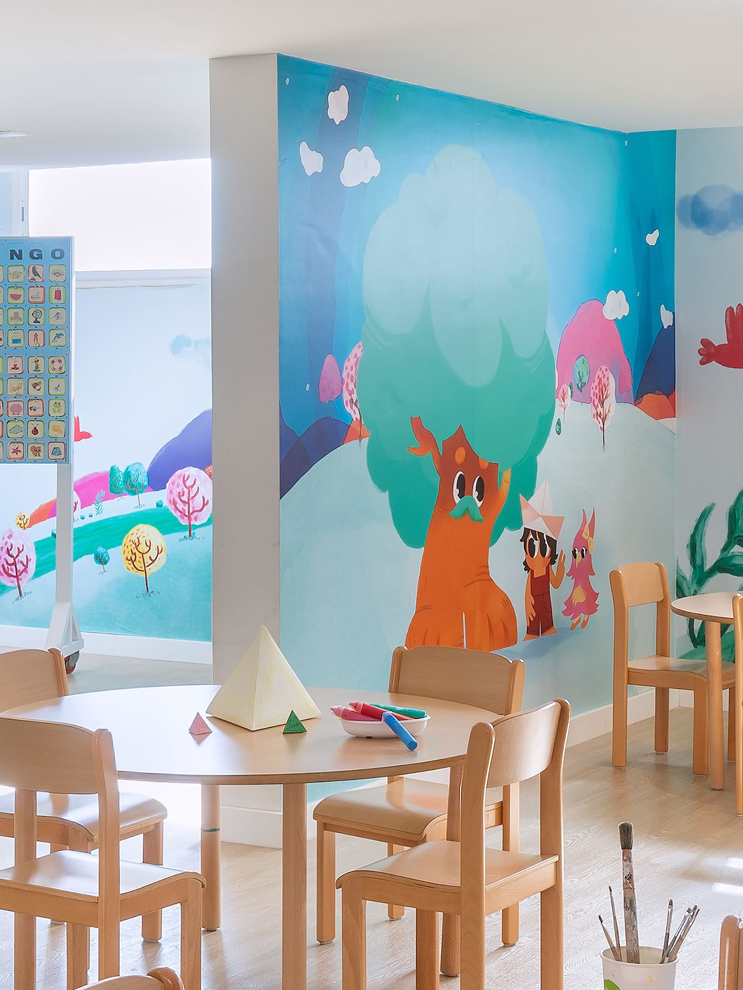 a room with a table and chairs