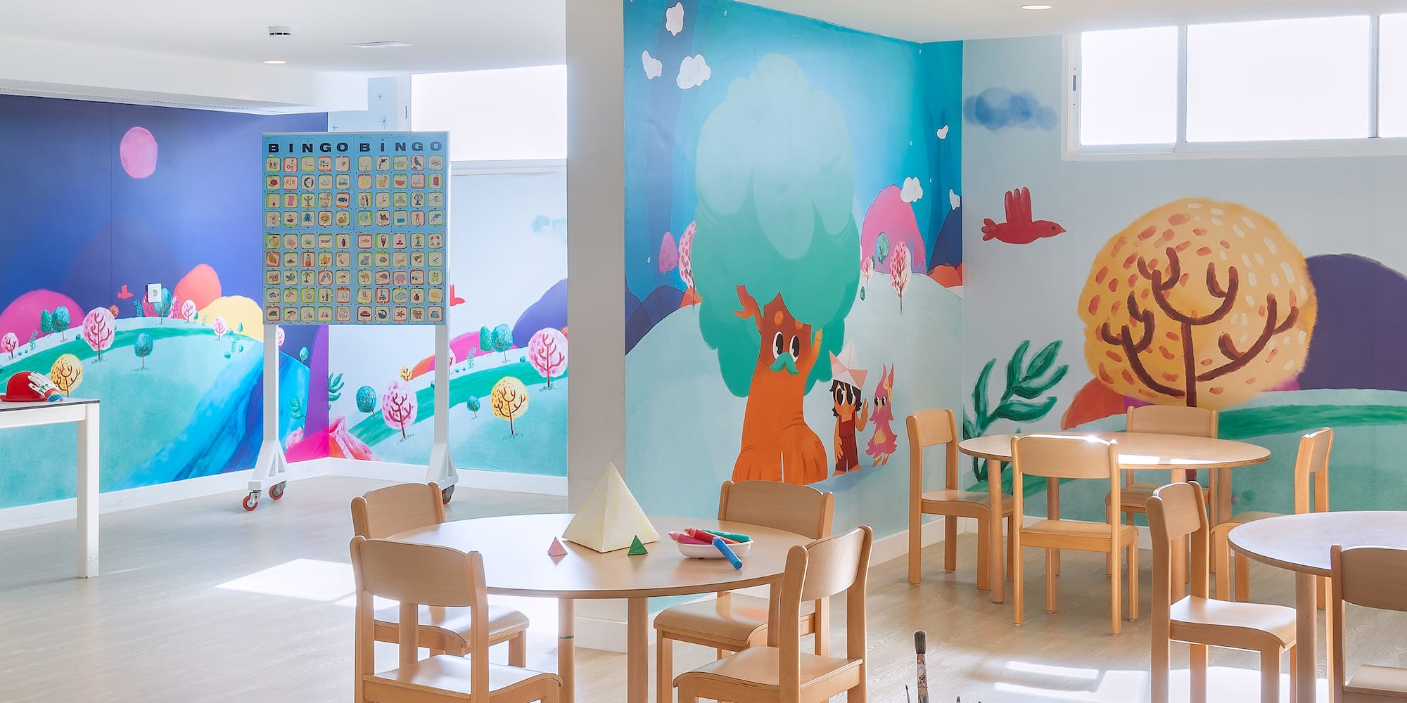 a room with a table and chairs