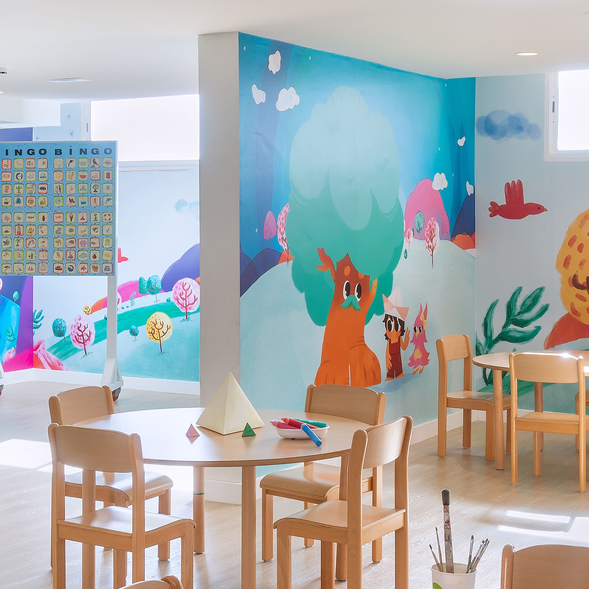 a room with a table and chairs