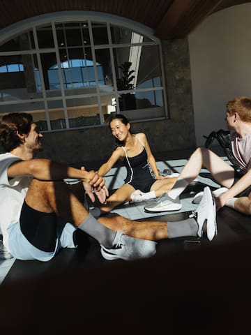 a group of people sitting on the floor