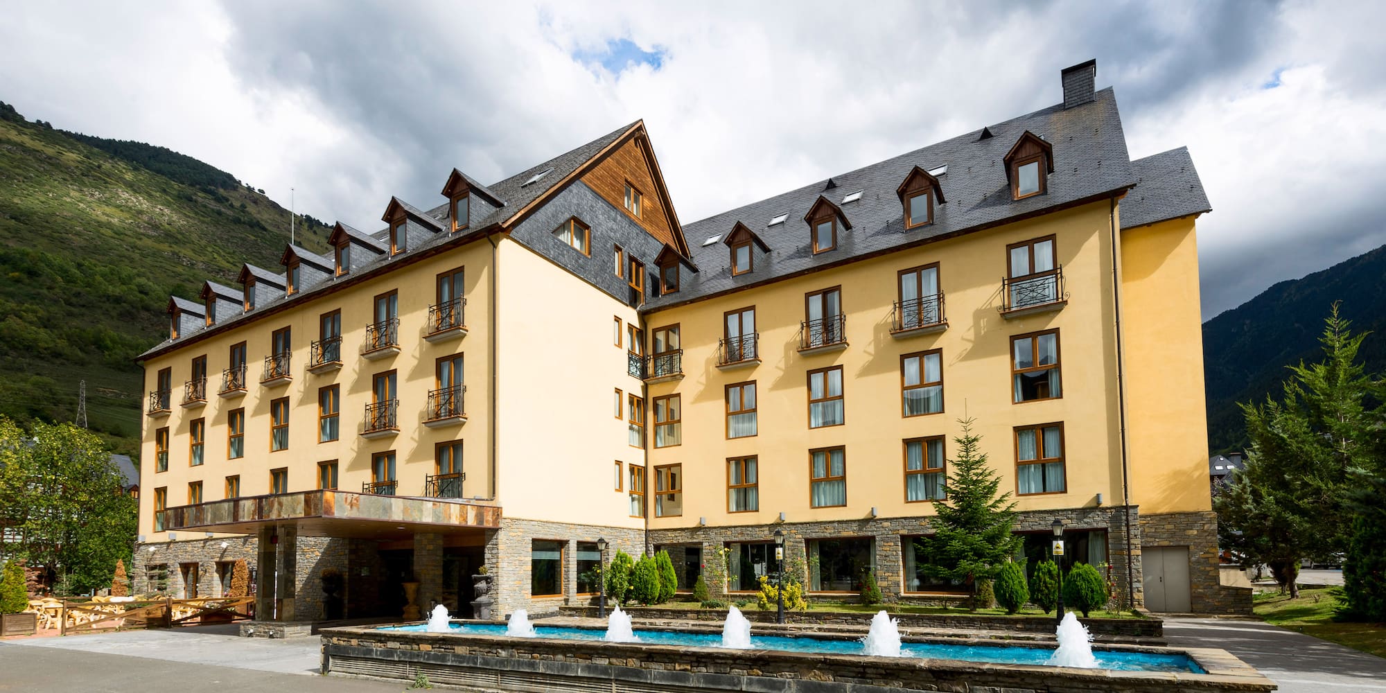 a building with a fountain in front of it