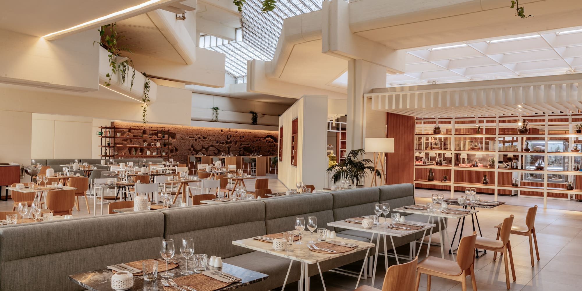 a restaurant with tables and chairs