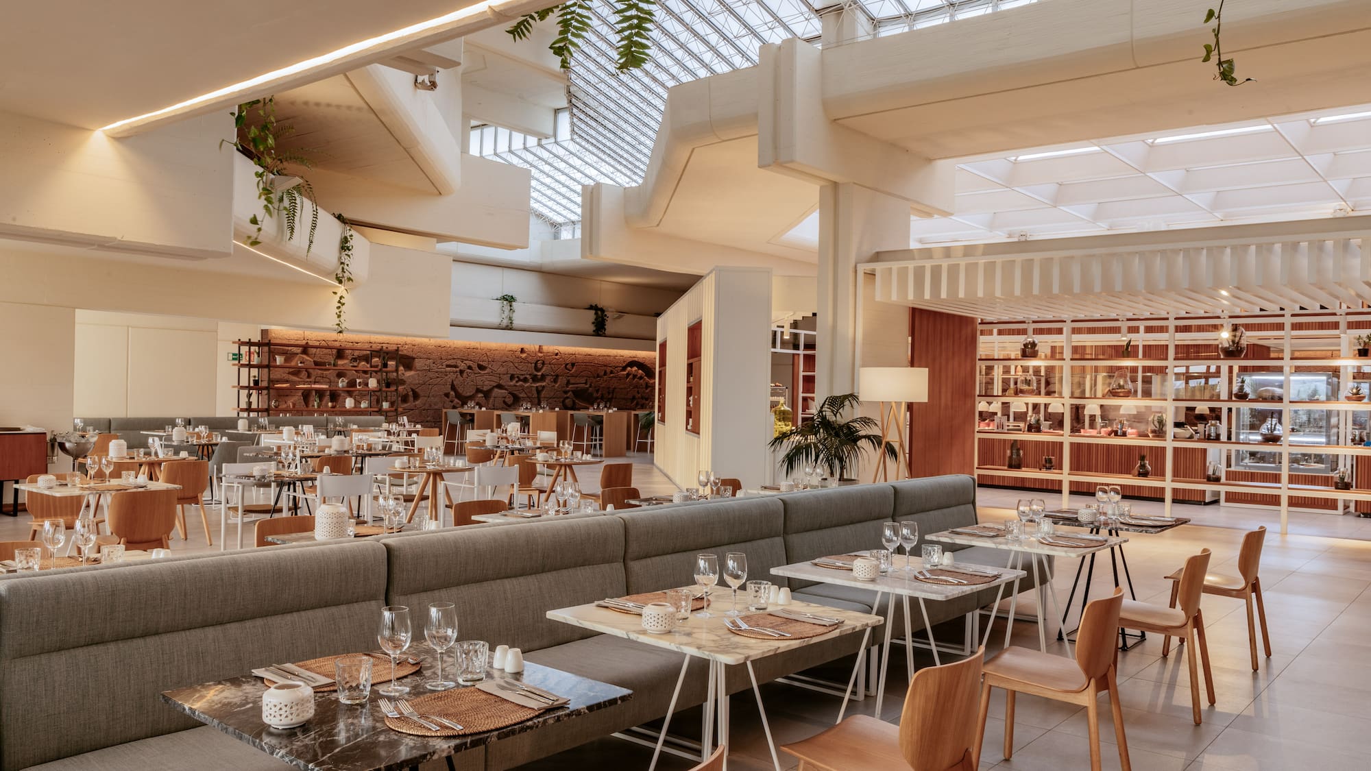 a restaurant with tables and chairs