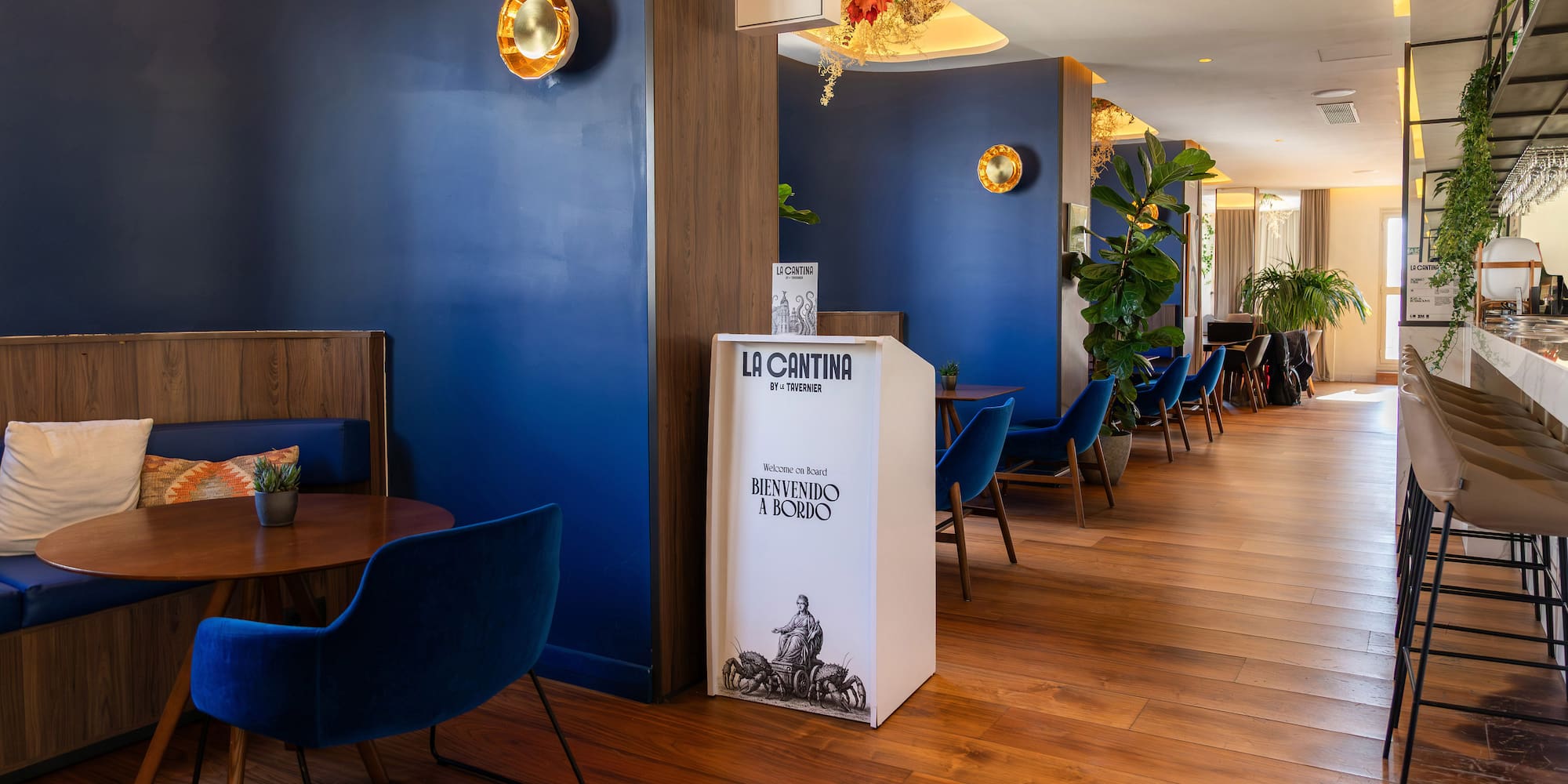 a room with blue walls and a wood floor