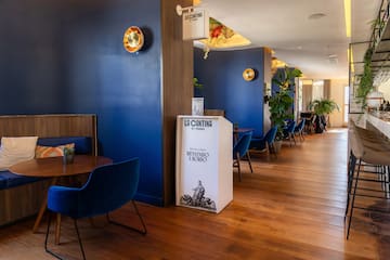 a room with blue walls and a wood floor