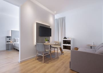 a room with a tv and a table