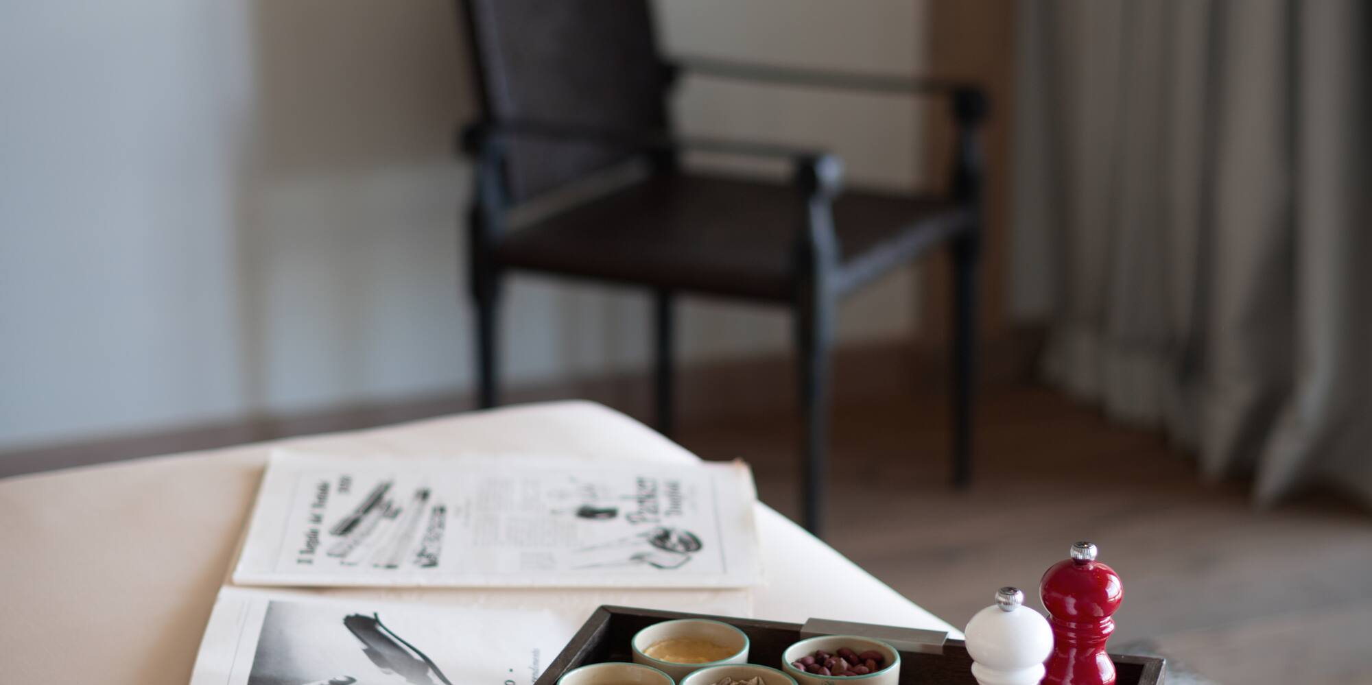 a tray of food on a bed