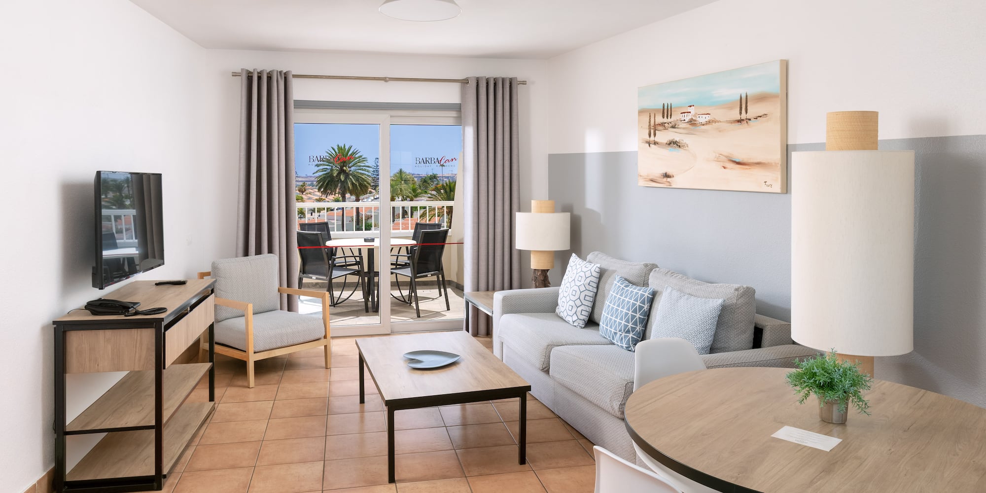 a living room with a couch and a table