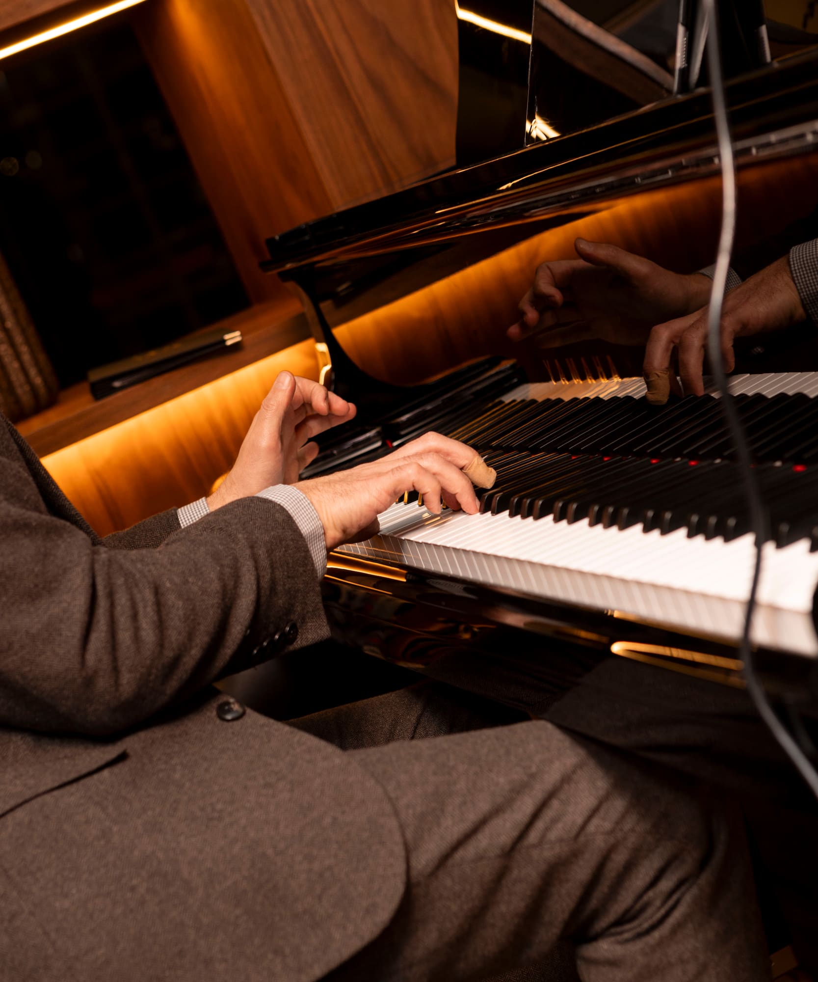 a person playing a piano