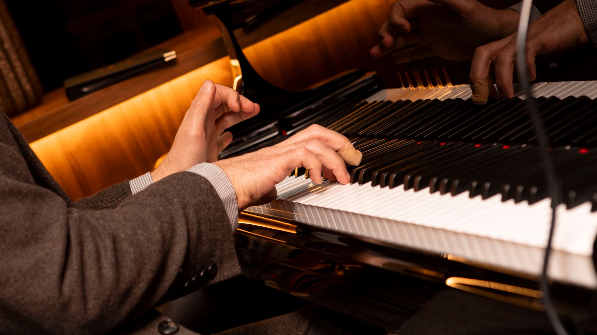 a person playing a piano