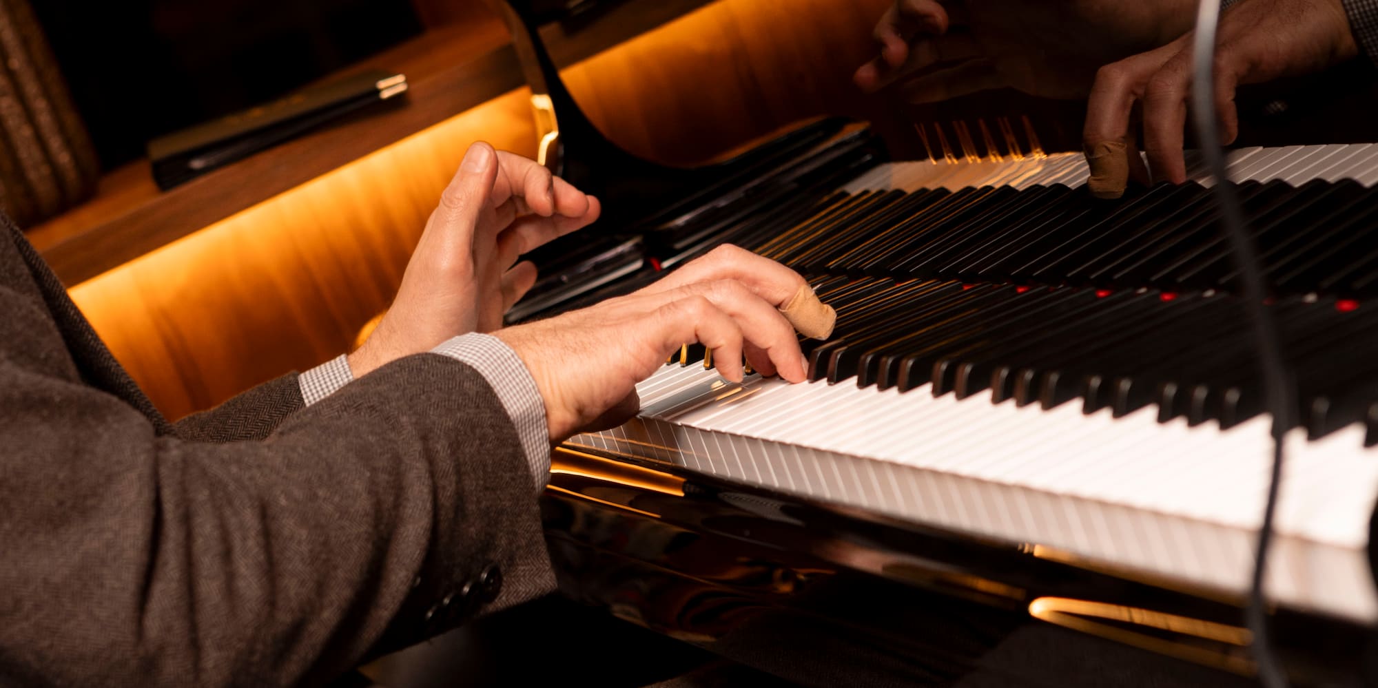a person playing a piano