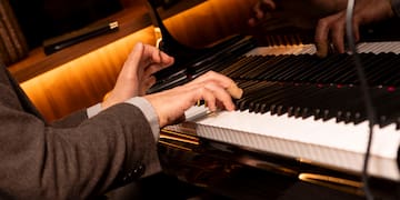 a person playing a piano