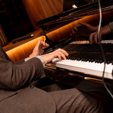 a person playing a piano