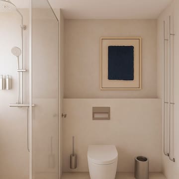 a bathroom with a glass shower door