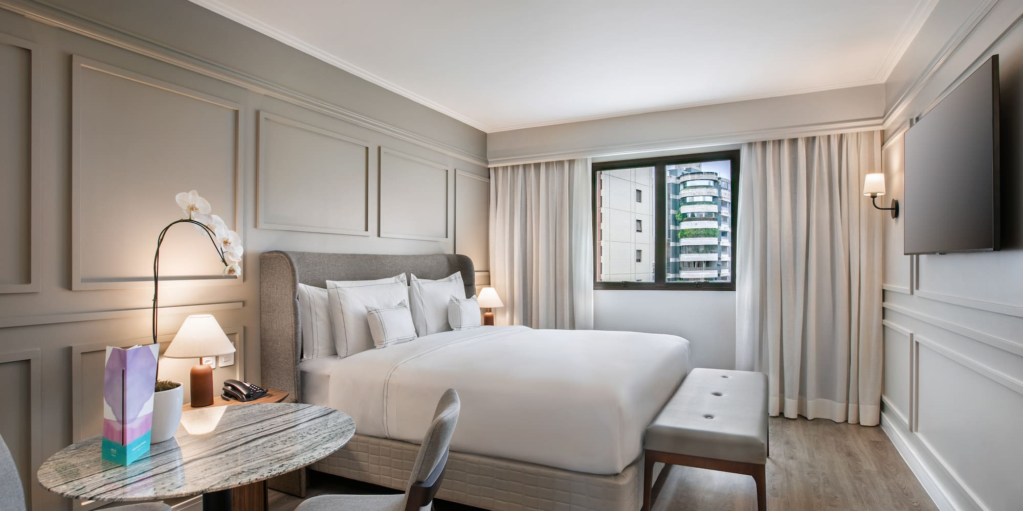 a room with a bed and a table