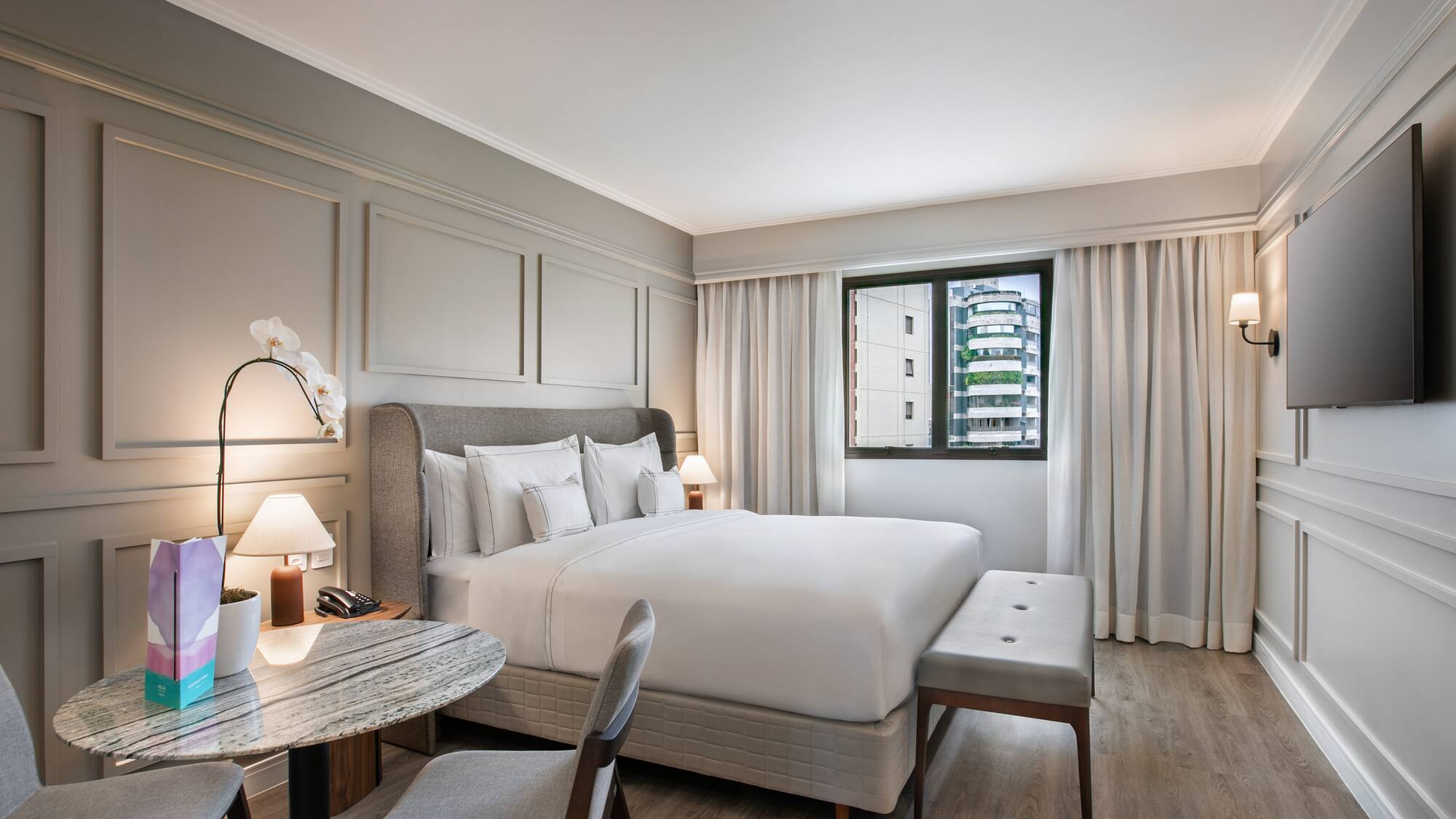 a room with a bed and a table