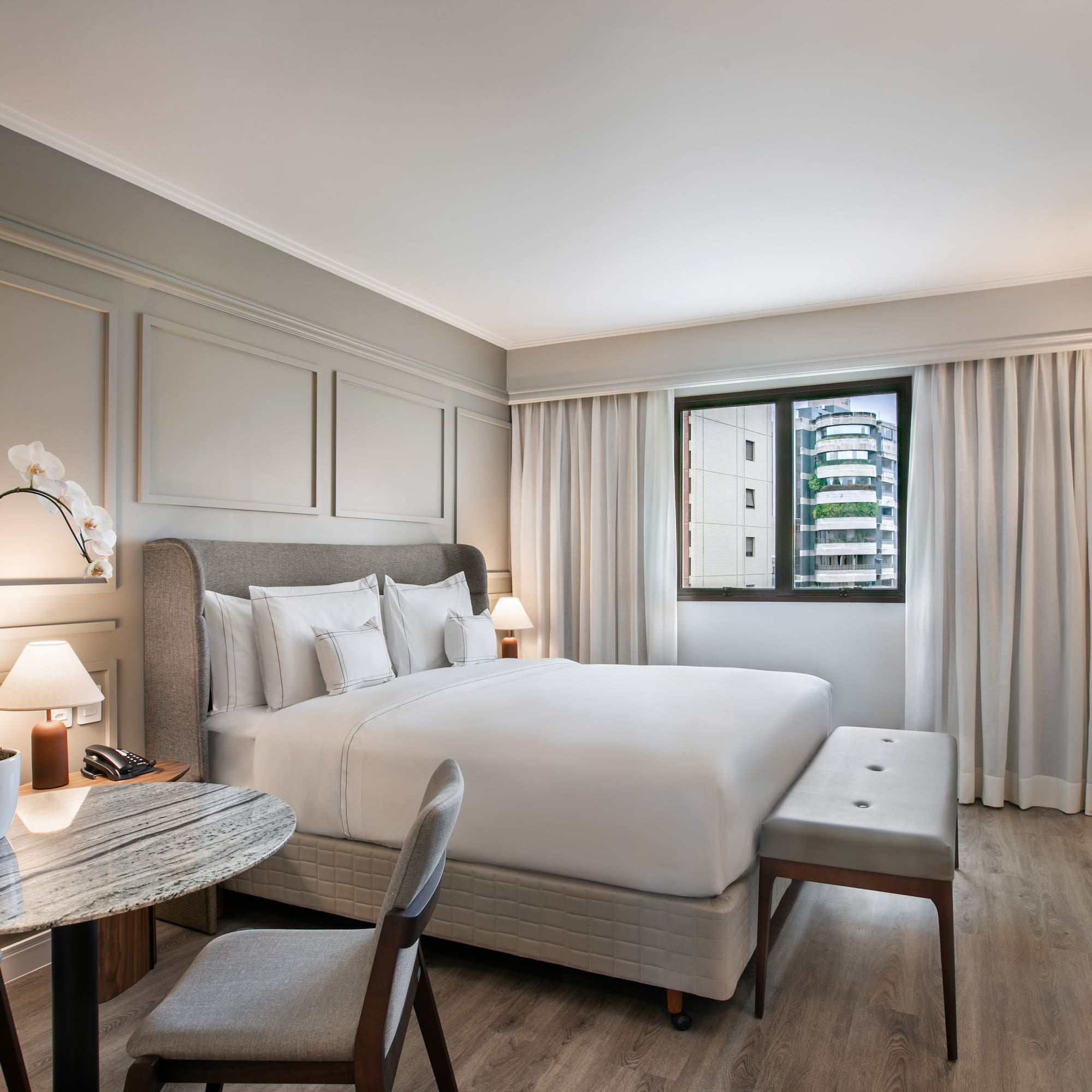 a room with a bed and a table