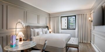 a room with a bed and a table