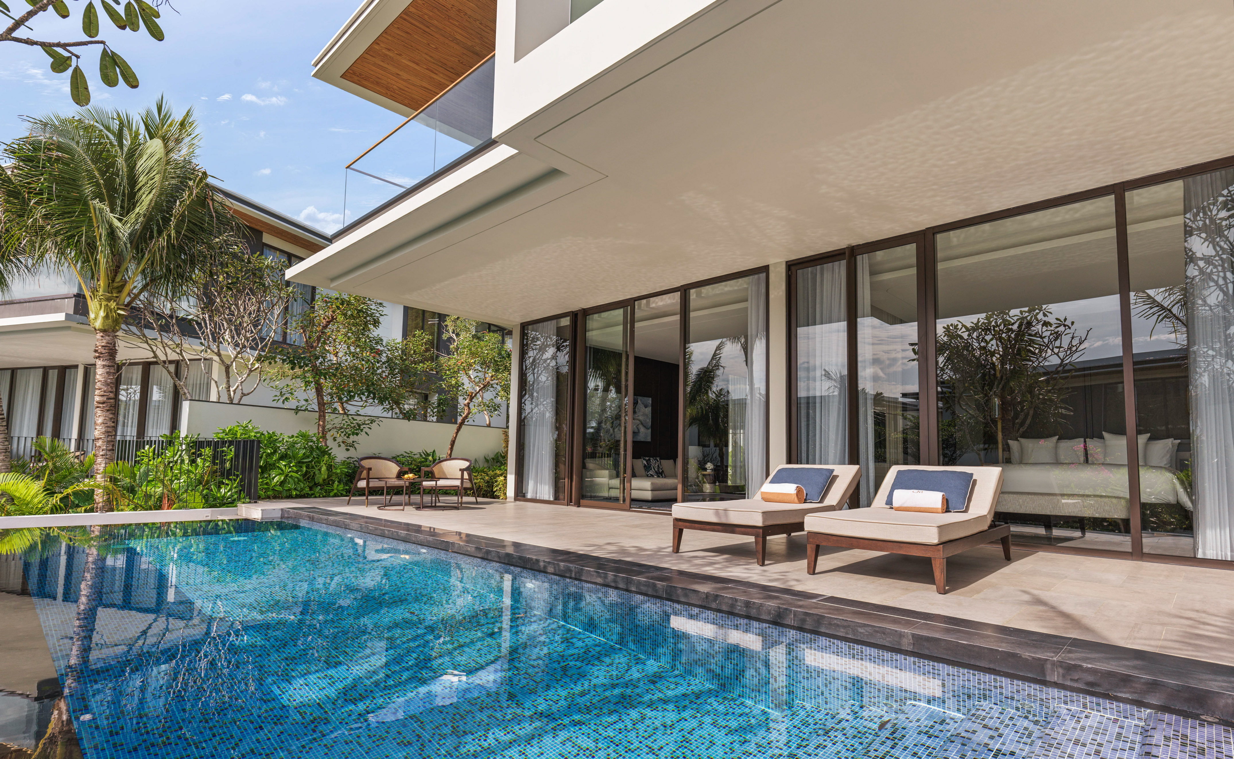 a pool in front of a house
