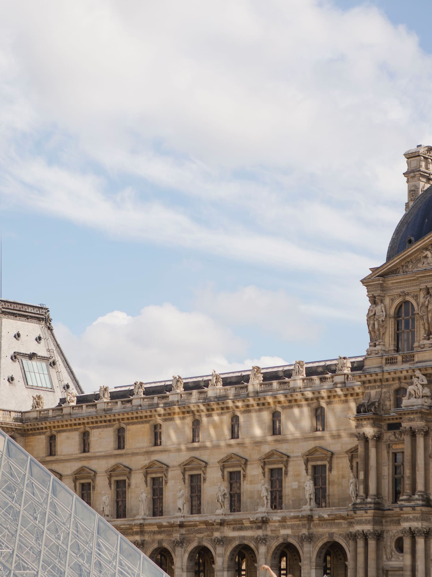 a building with a glass pyramid