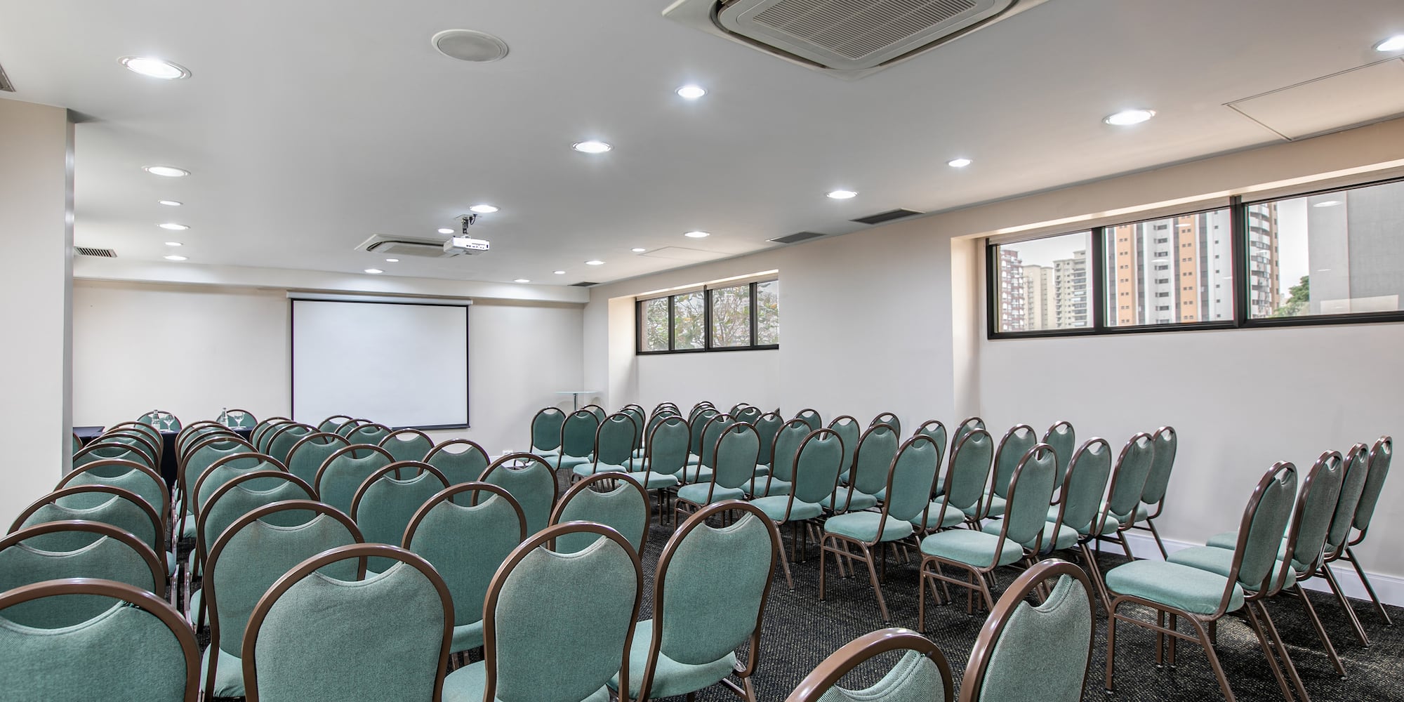 a room with rows of chairs