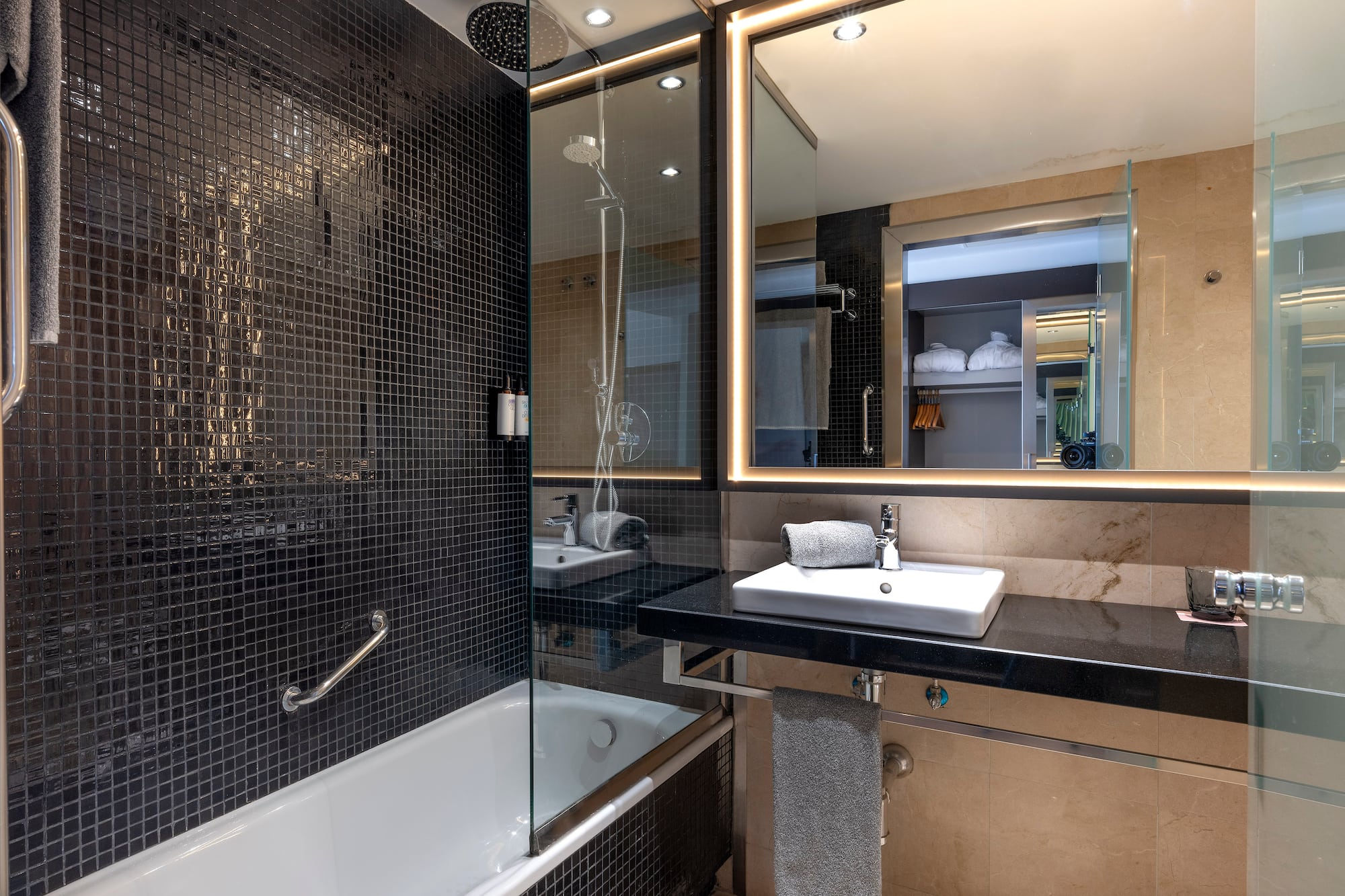 a bathroom with a sink and a shower