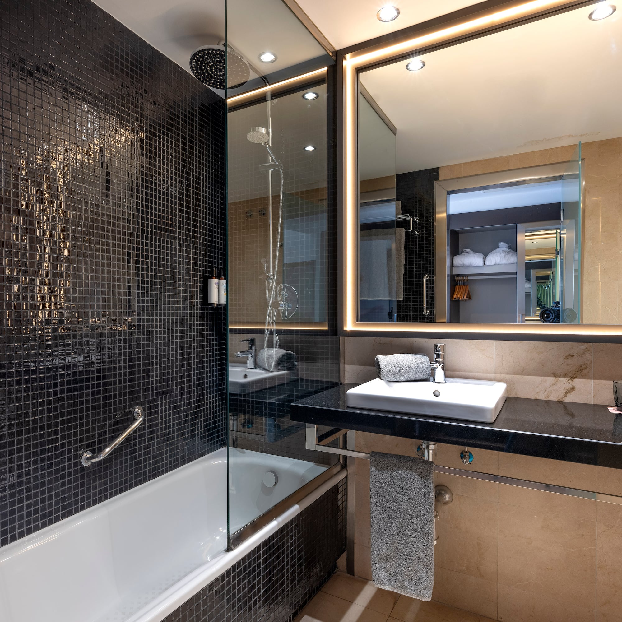 a bathroom with a sink and a shower