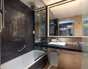 a bathroom with a sink and a shower