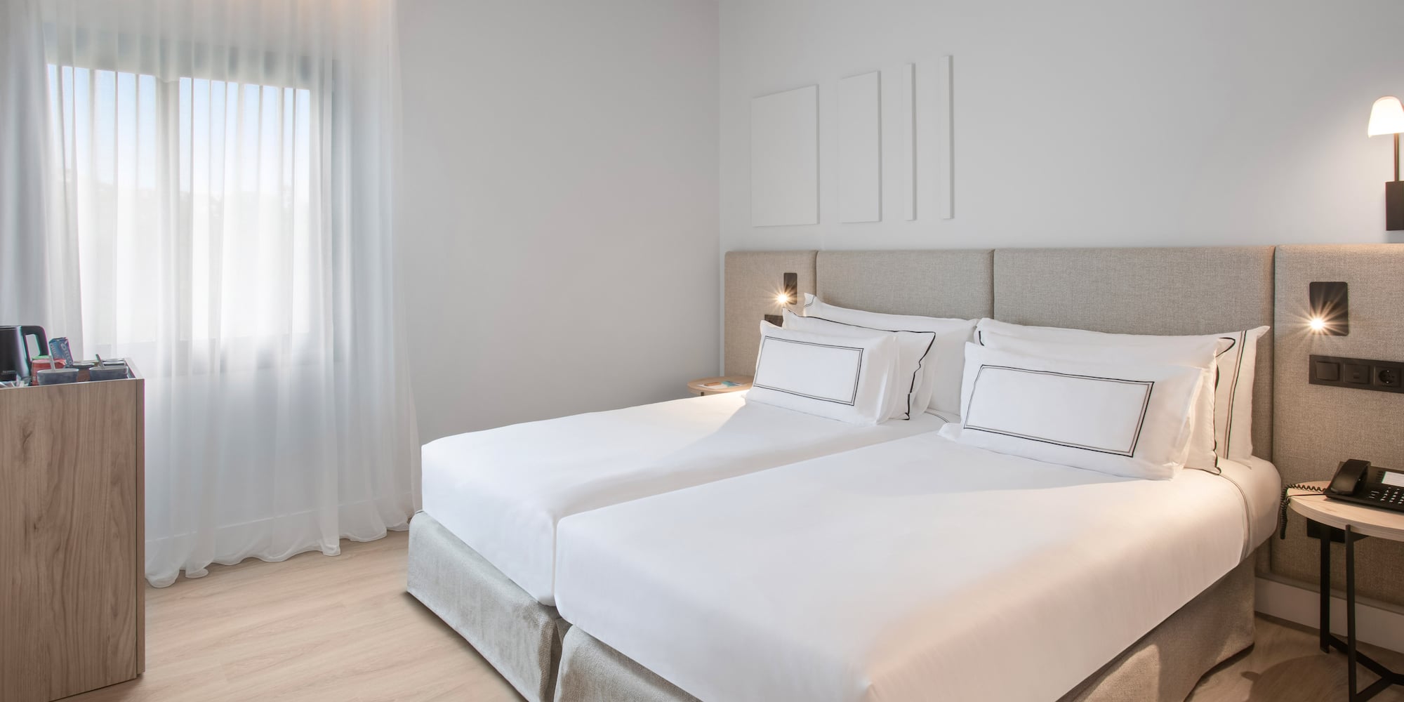 a bedroom with two beds