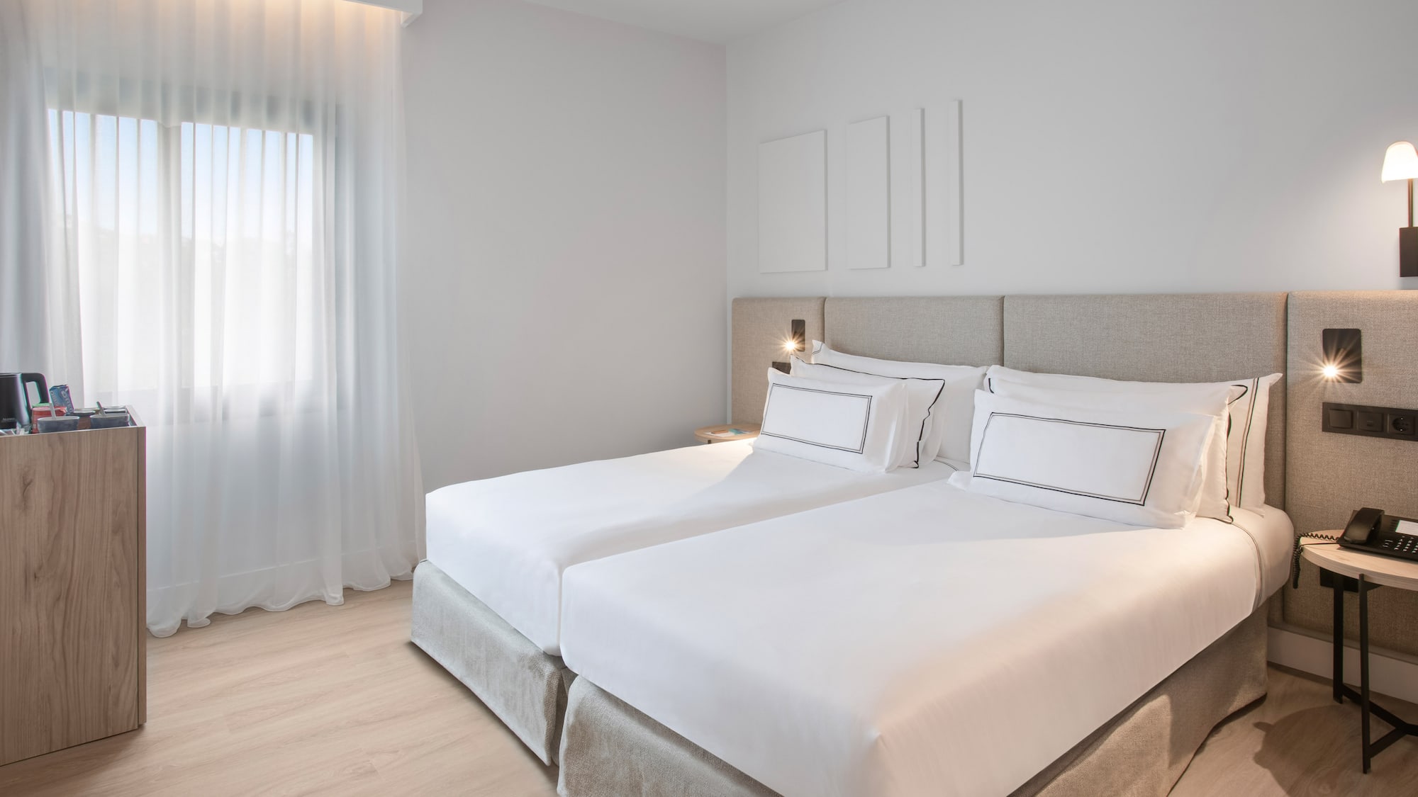 a bedroom with two beds