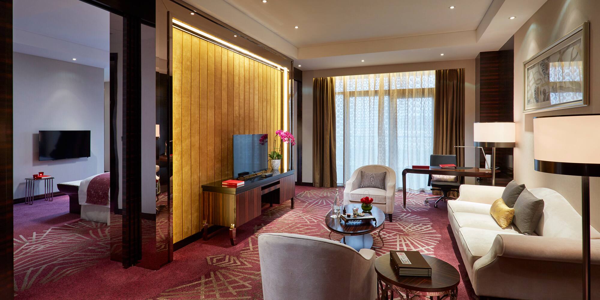 a room with a television and a couch