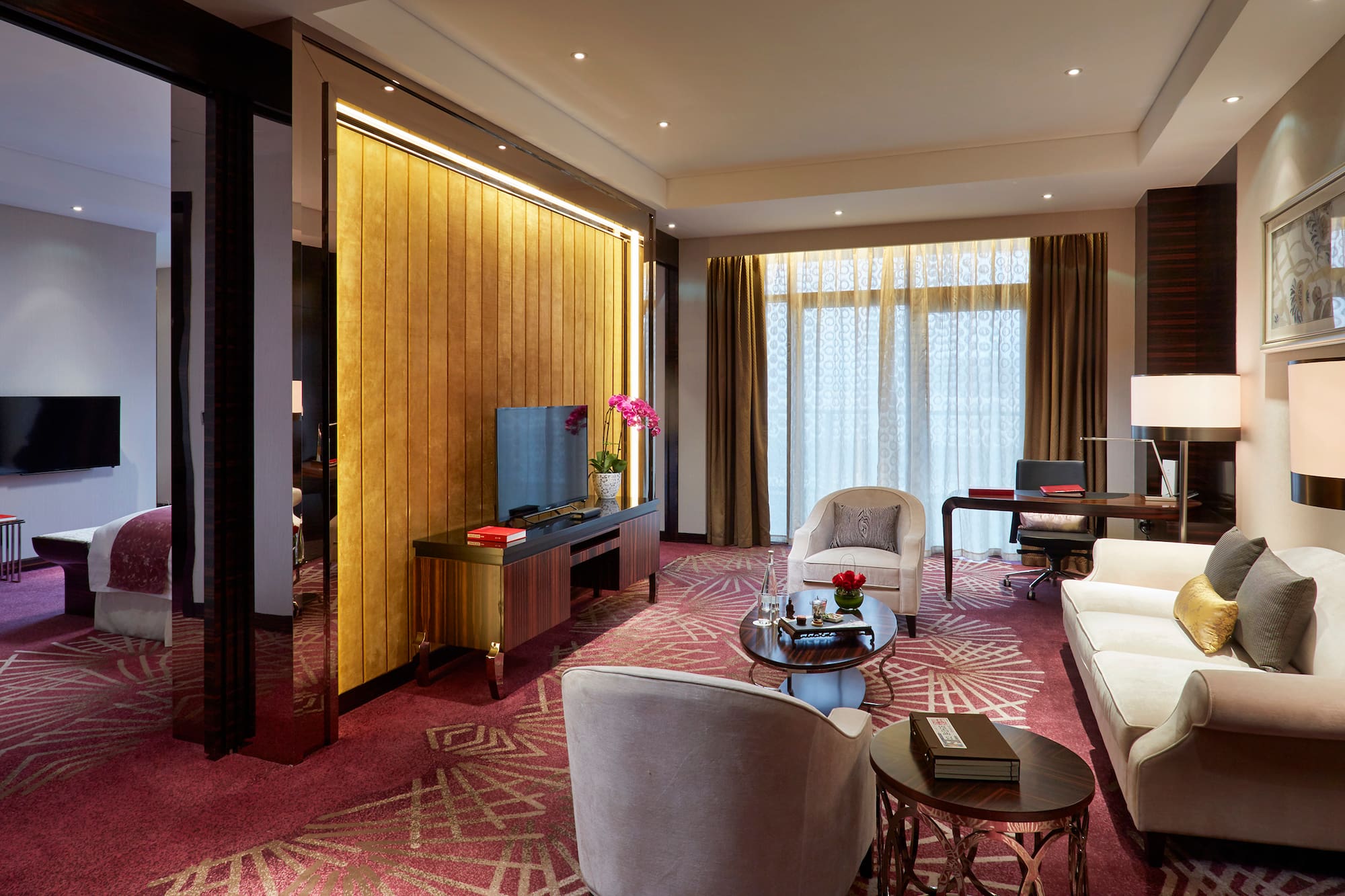 a room with a television and a couch