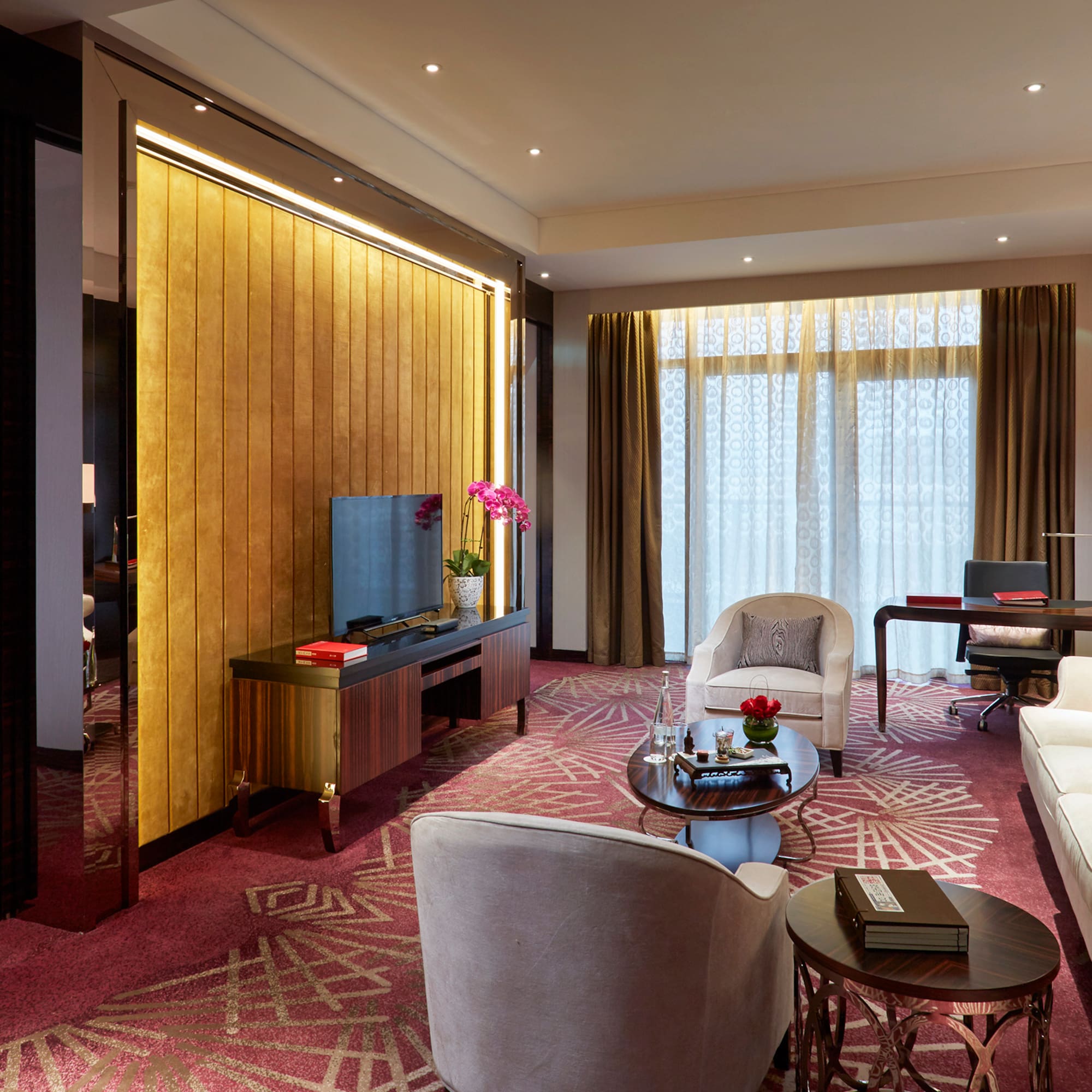 a room with a television and a couch