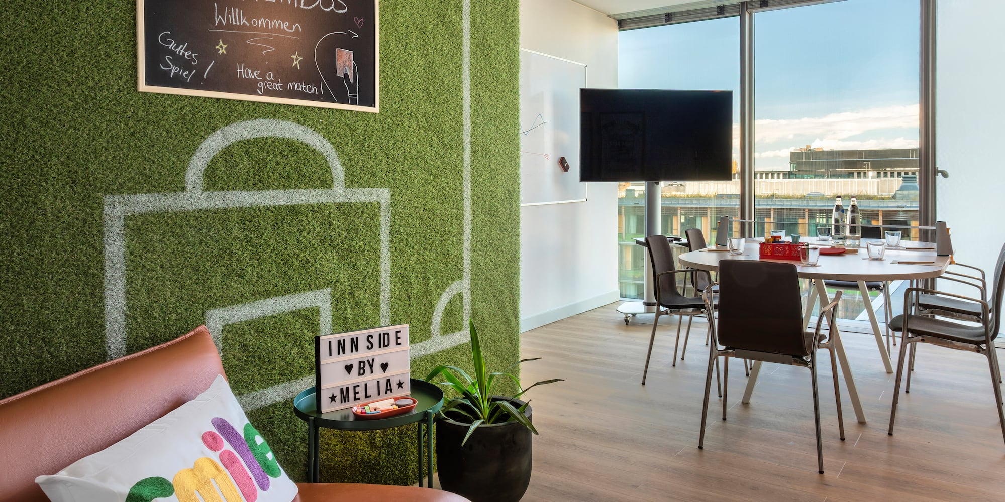 a room with a table and chairs