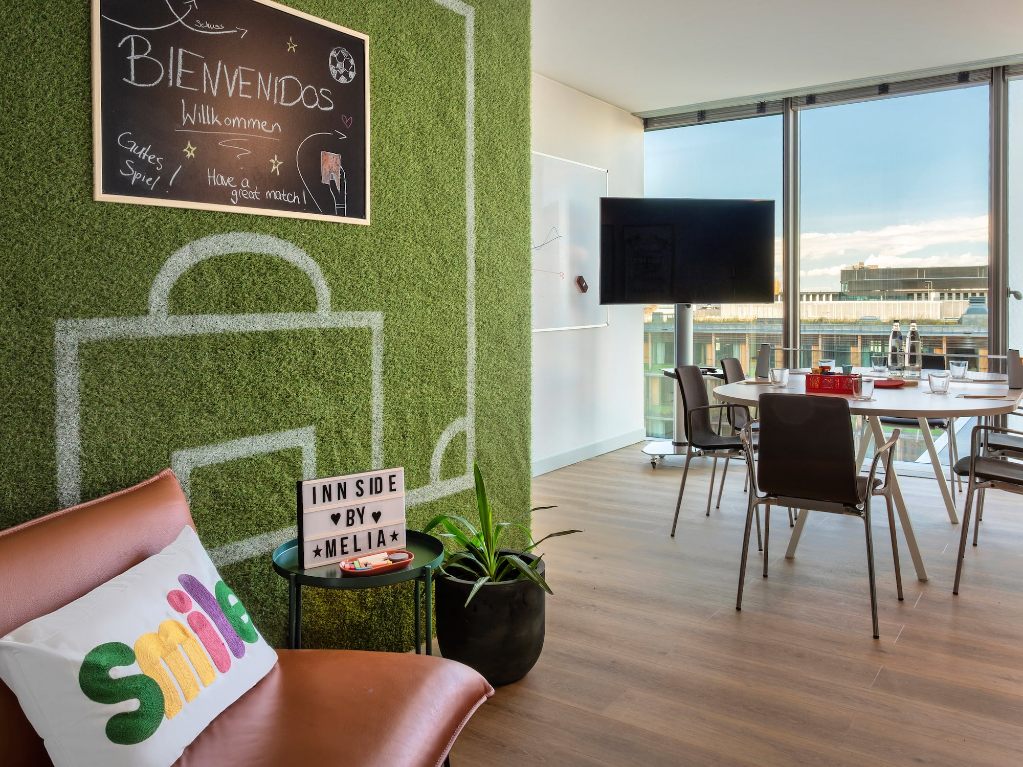 a room with a table and chairs