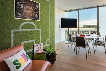 a room with a table and chairs