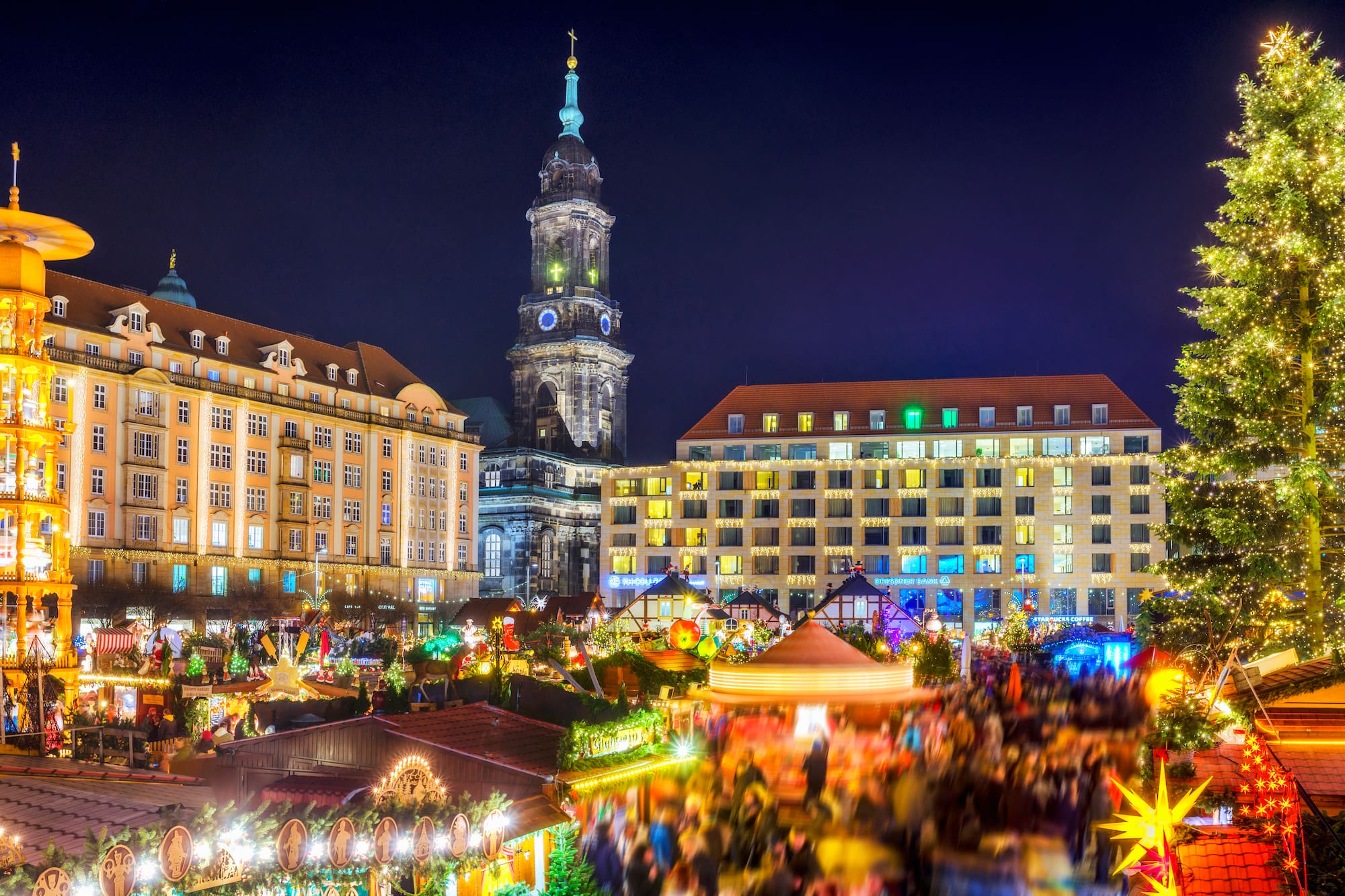 a large crowd of people in a city