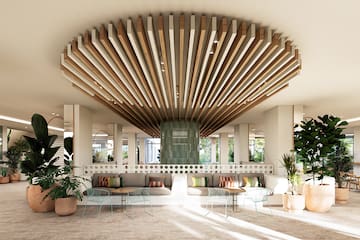 a room with a large ceiling and a large chandelier