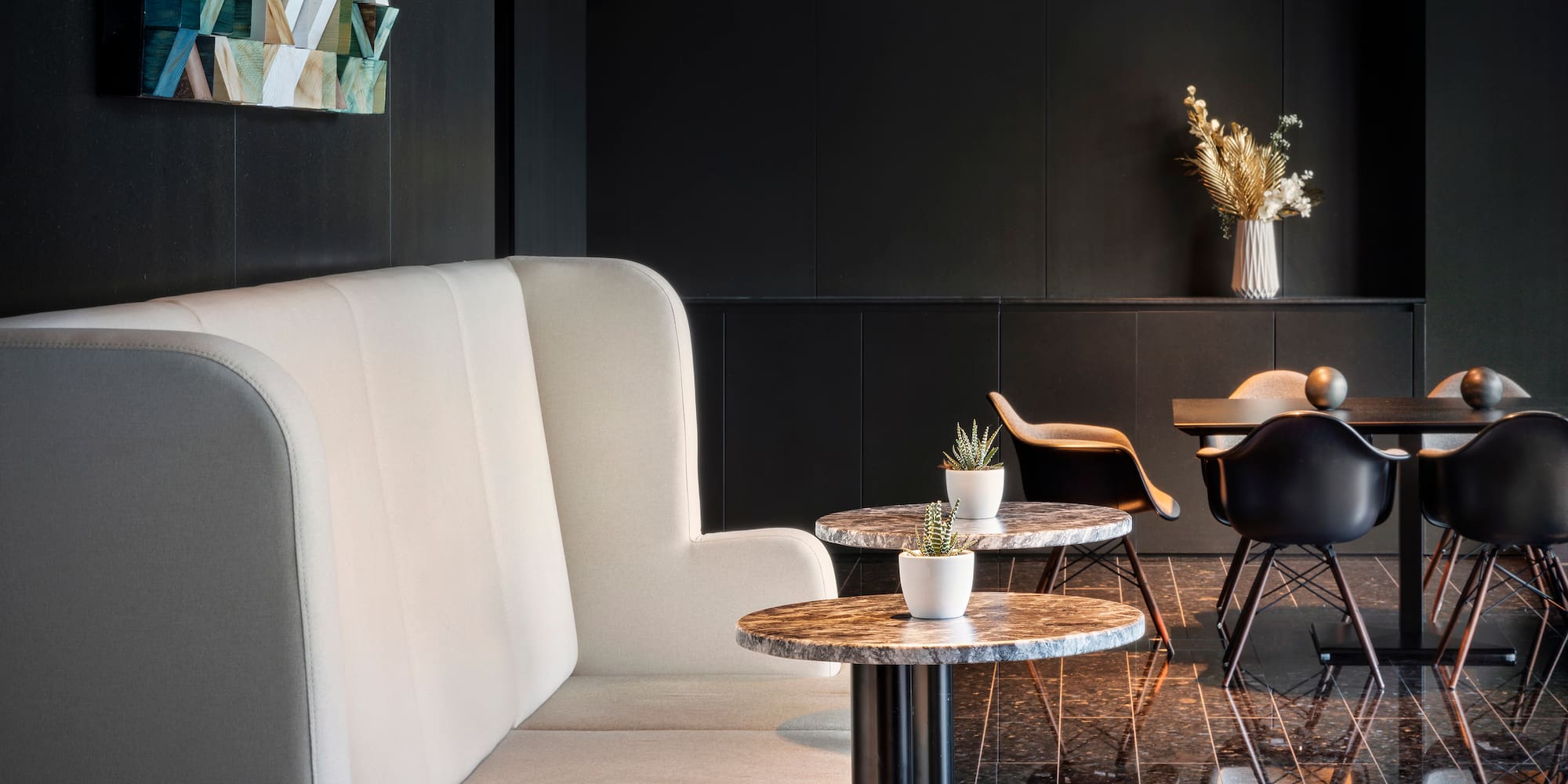 a white couch and a table in a room