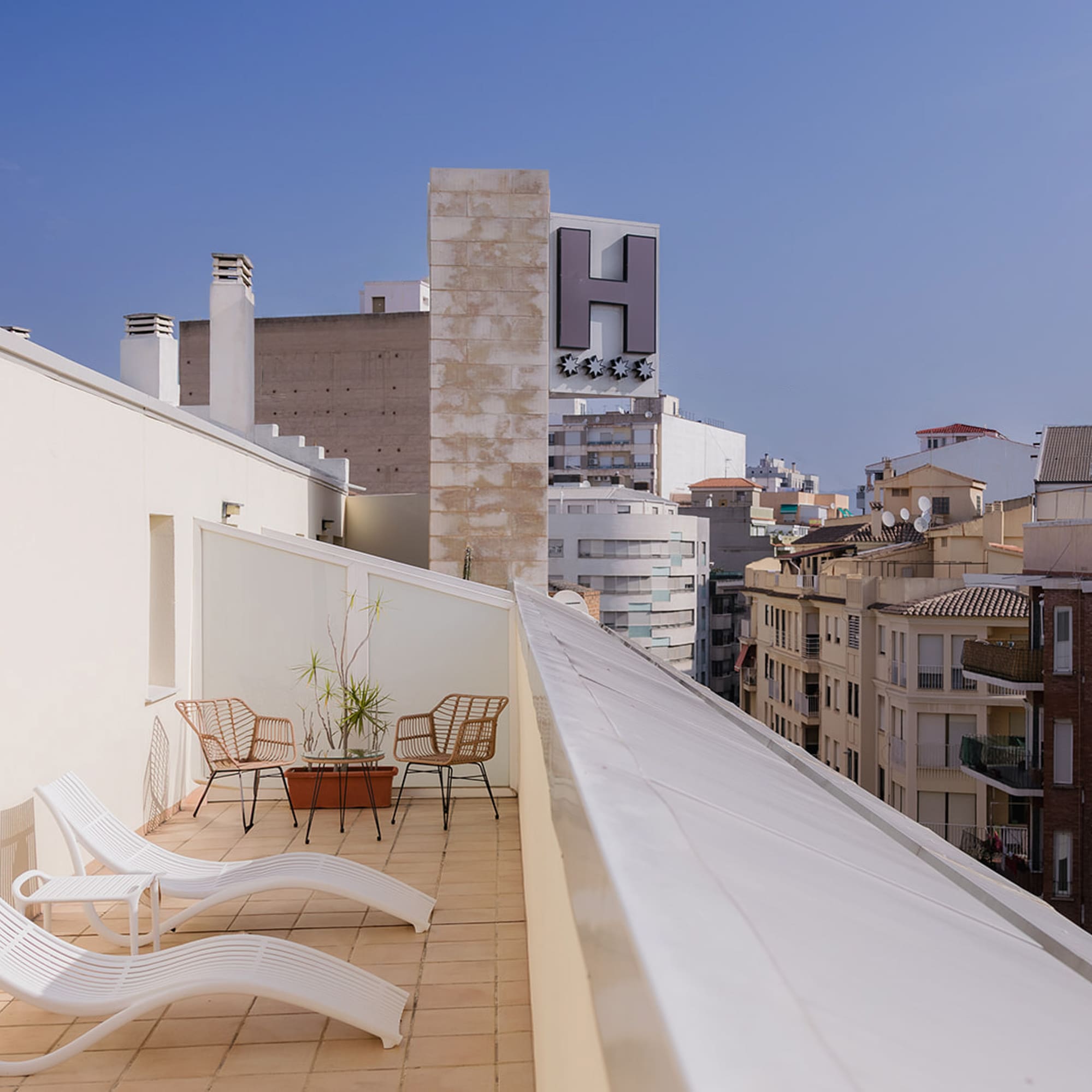 chairs on a rooftop deck