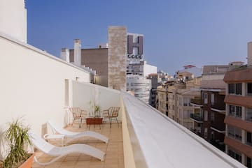 chairs on a rooftop deck