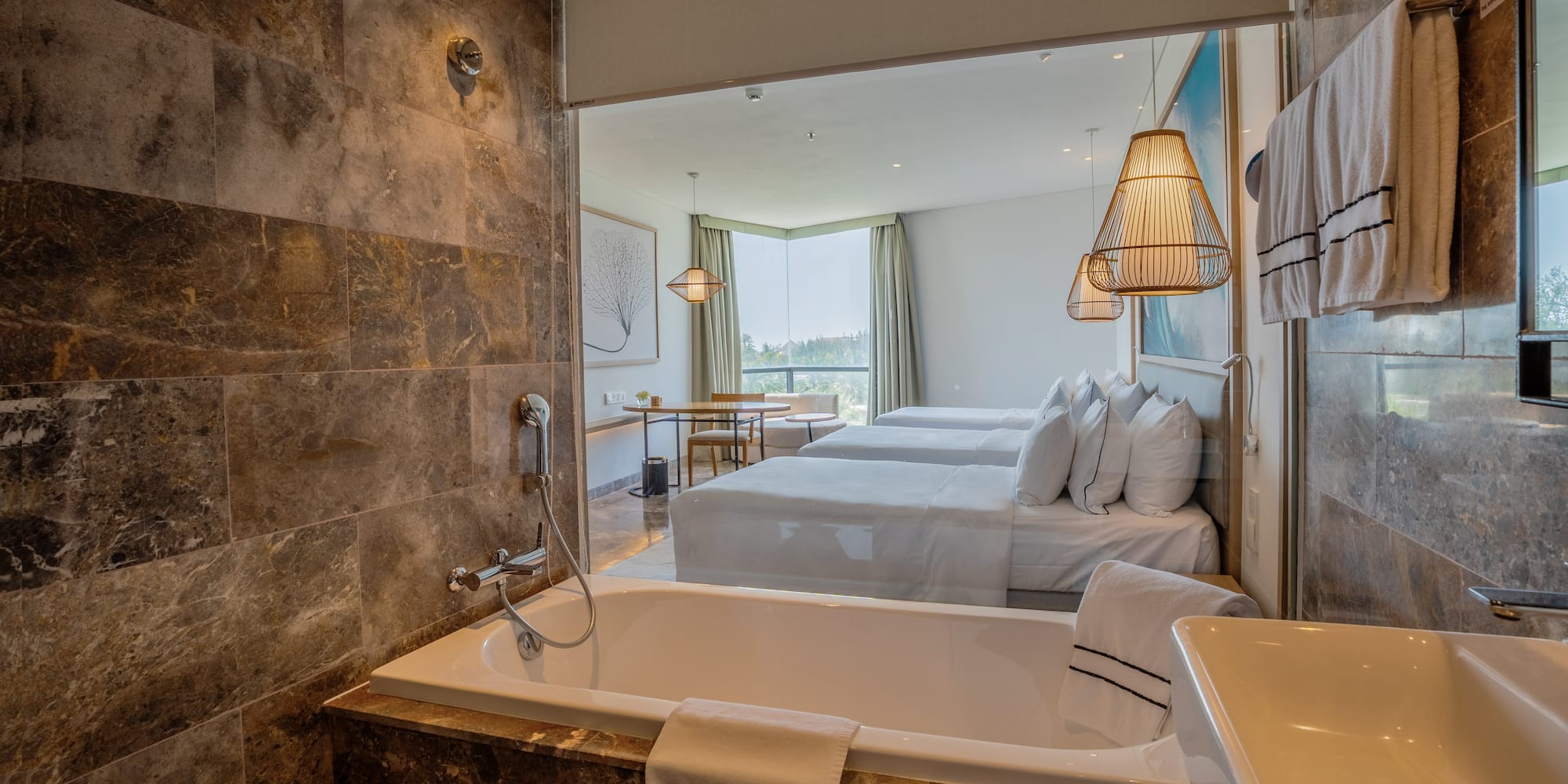 a bathroom with a bathtub and a sink